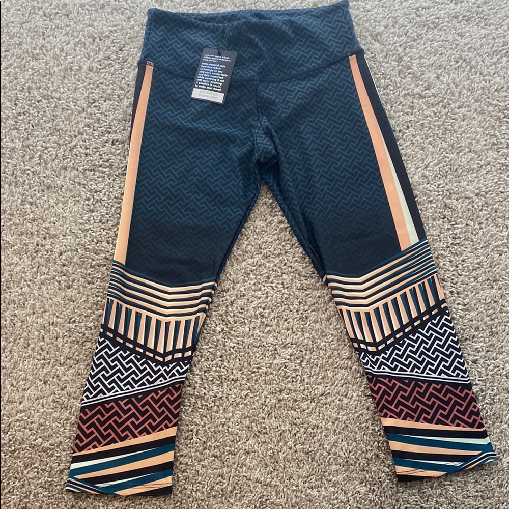 Onzie graphic Capri leggings. BNWT. 3 pair left.